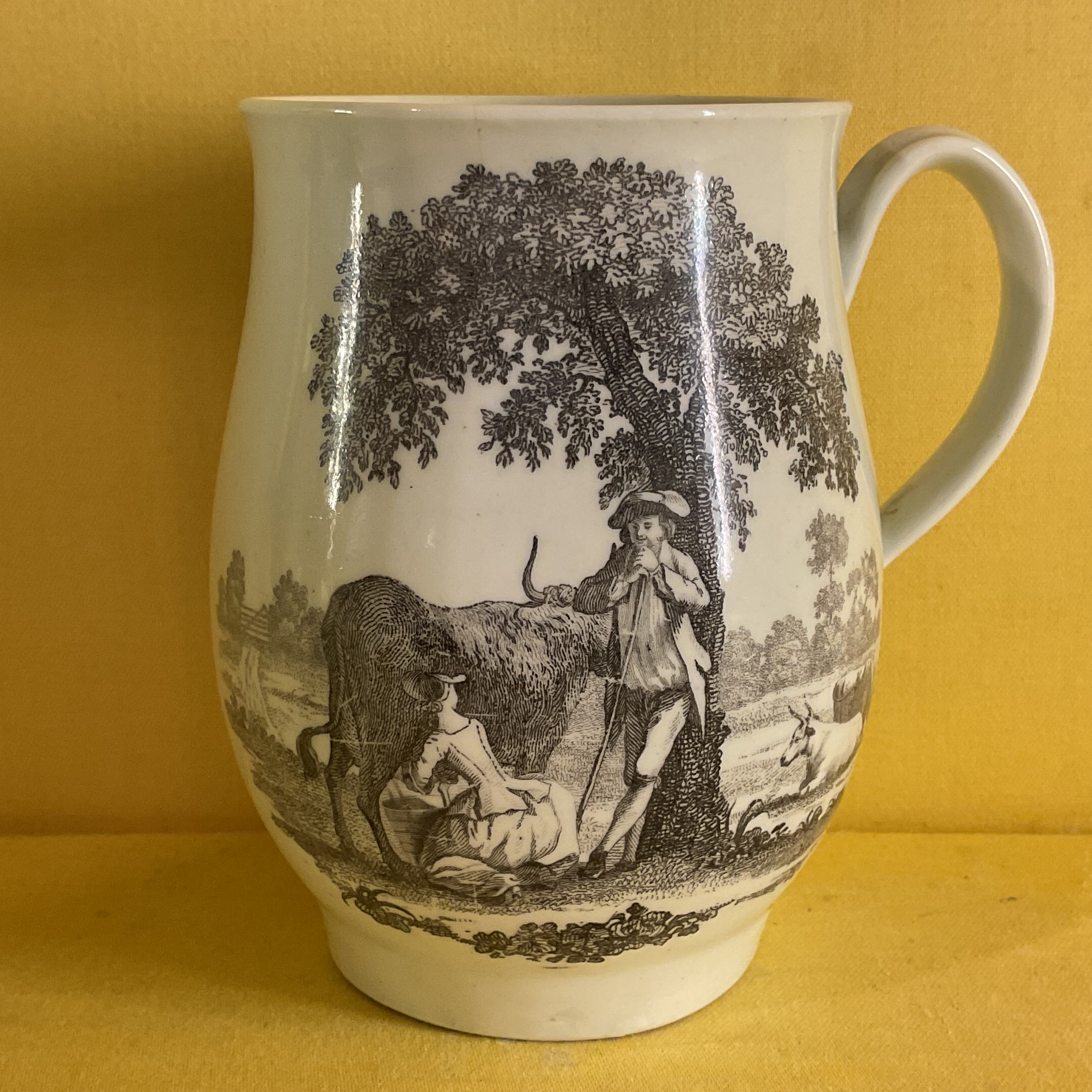 A Worcester baluster shaped mug 