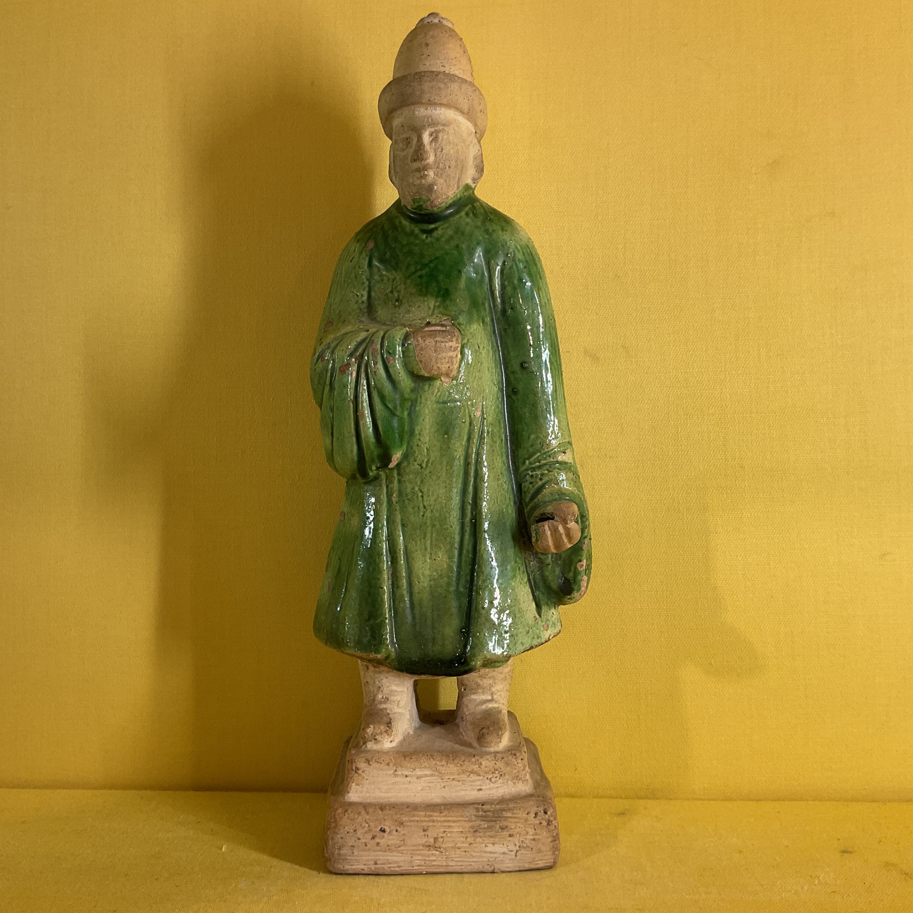 A Chinese green glazed biscuit figure 
