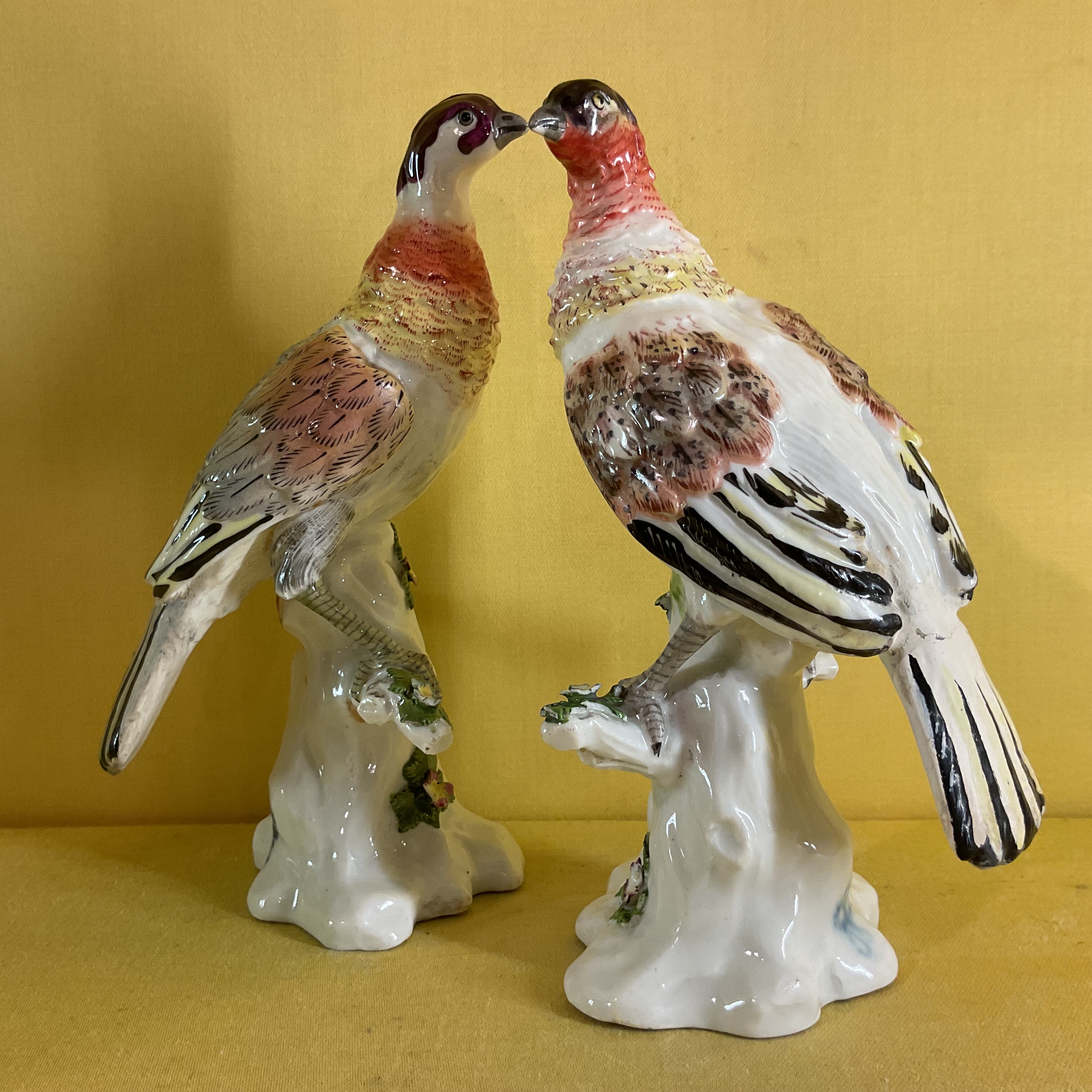 A pair of Dresden porcelain models of birds 