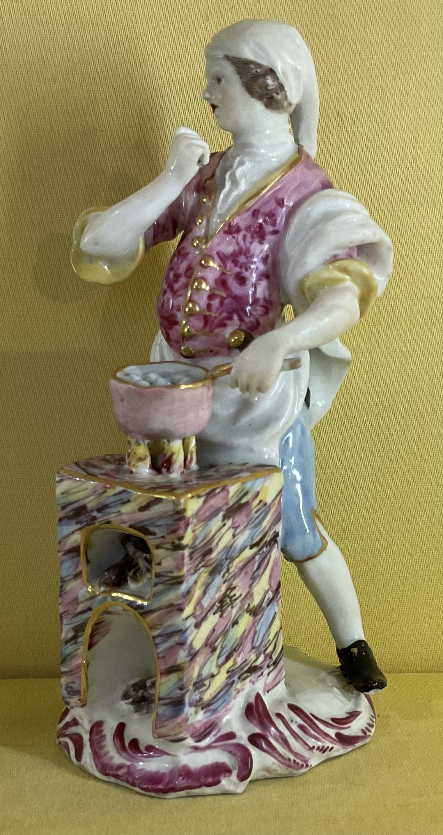 A rare Bow figure of a street cook 
