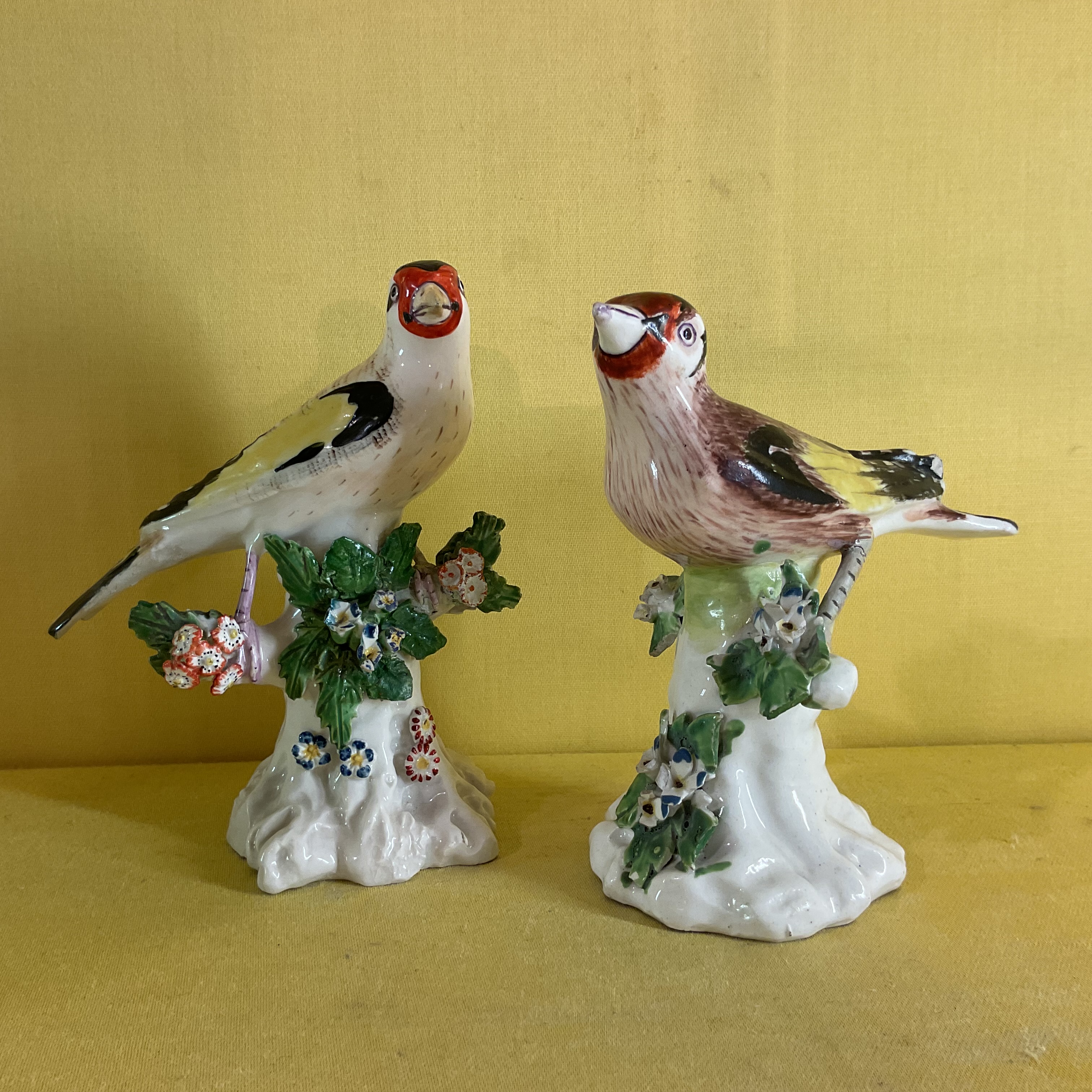 A pair of Derby models of Goldfinches 