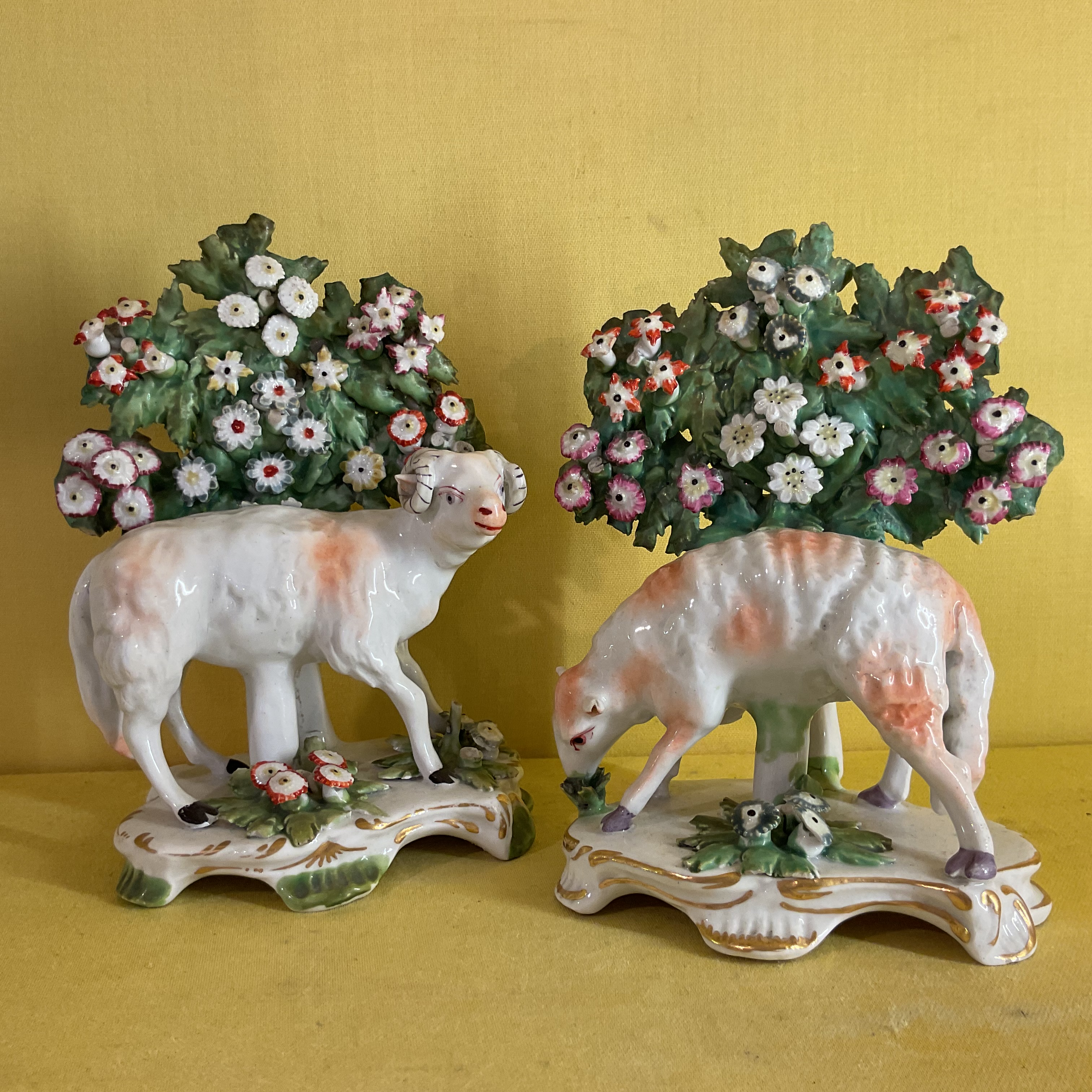 A pair of Bow models of a ewe and a ram 