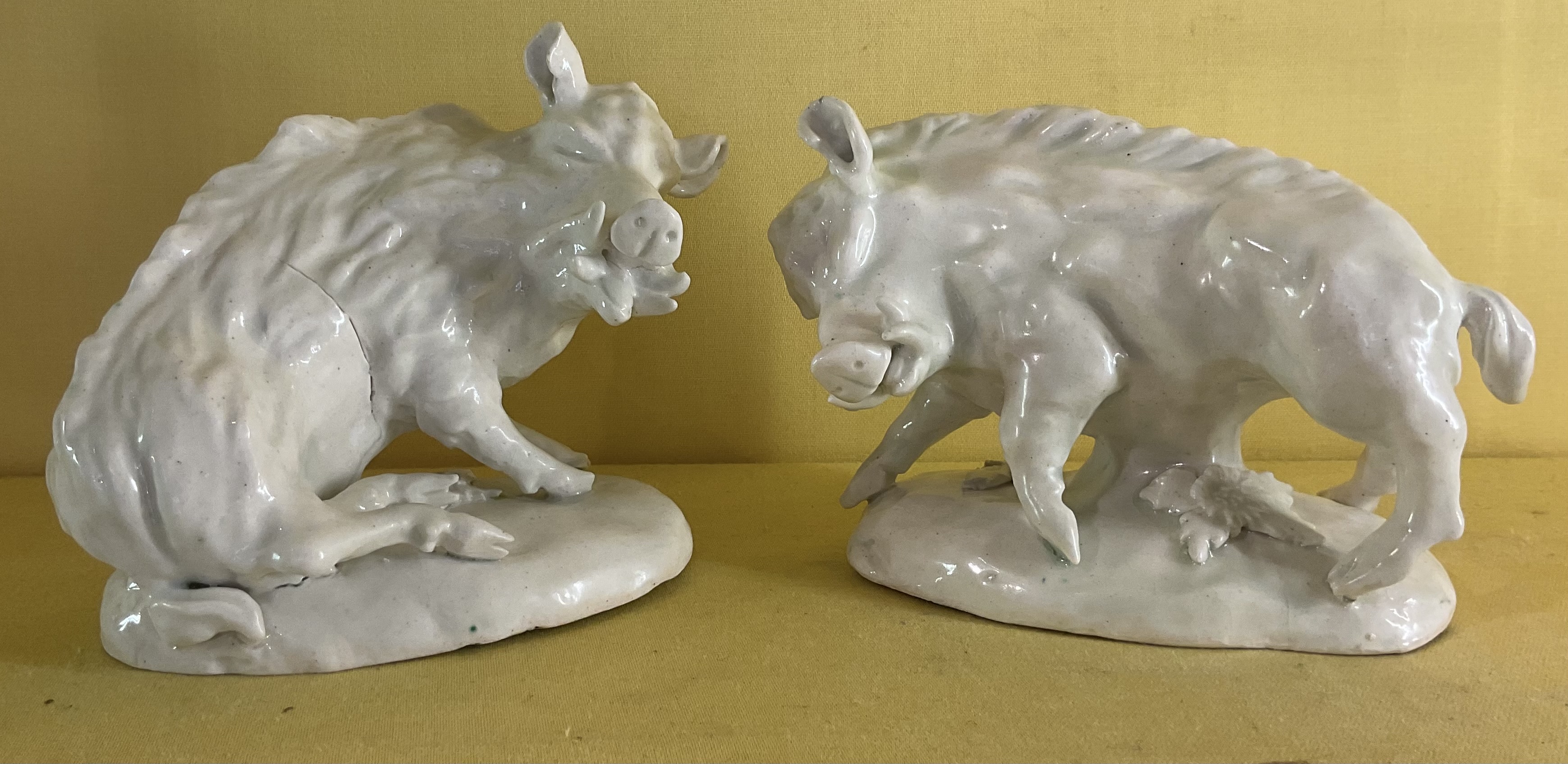A rare pair of Derby ‘dry edge’ models of Florentine wild boars 
