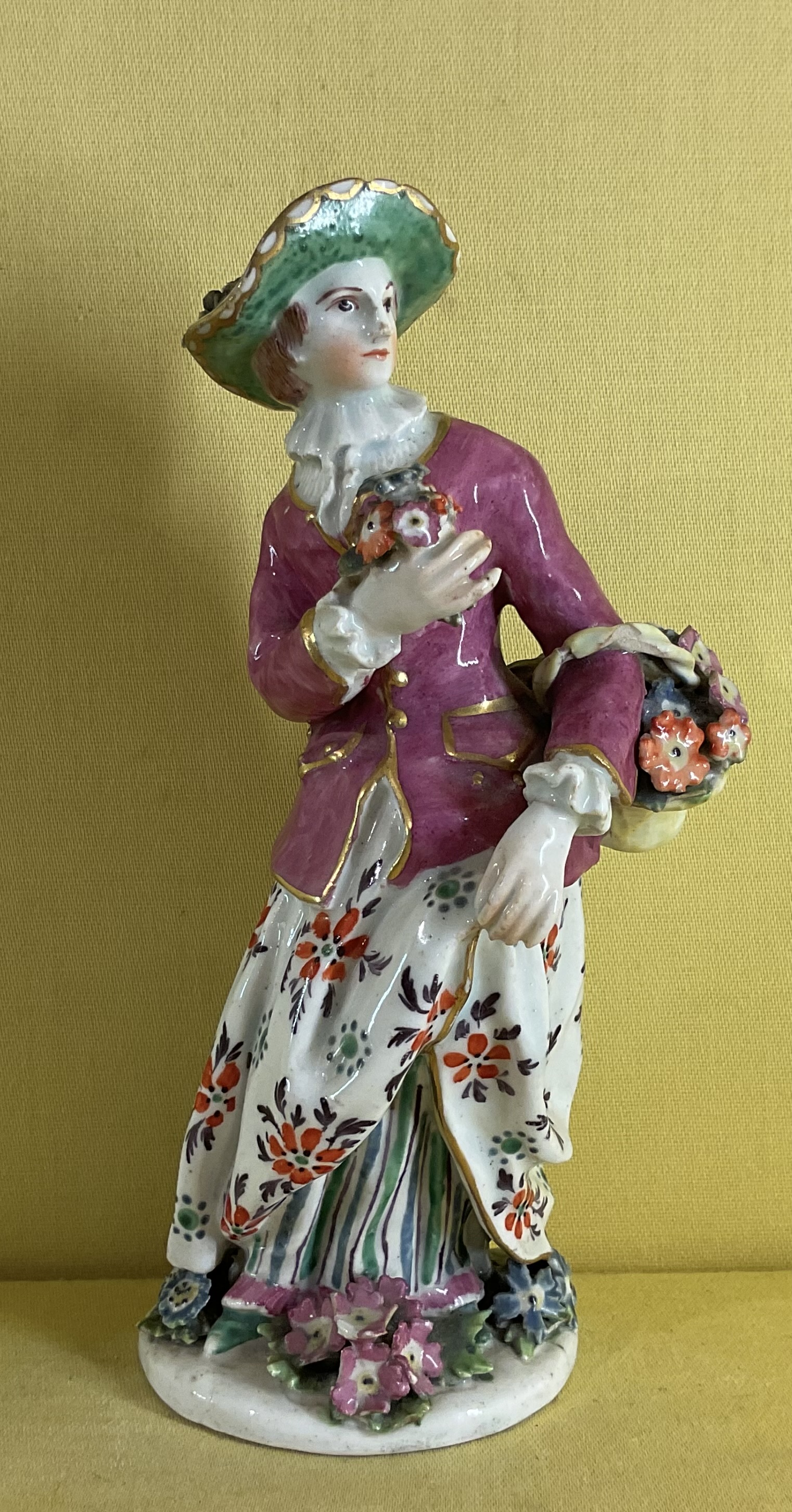 A rare Bow figure of a flower girl 