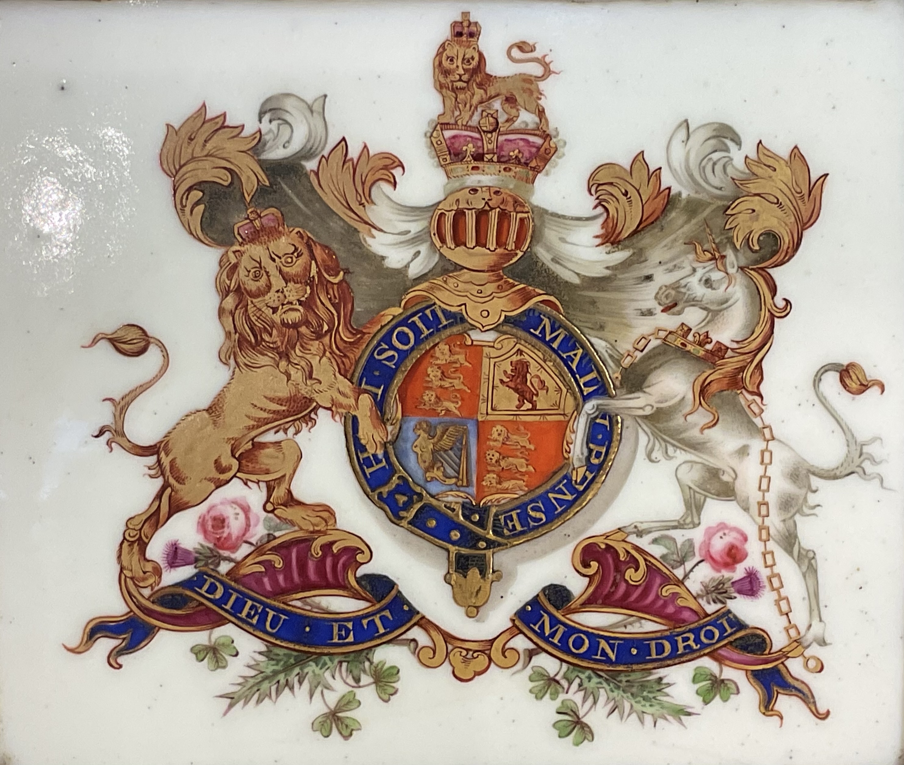 An unusual English porcelain armorial plaque