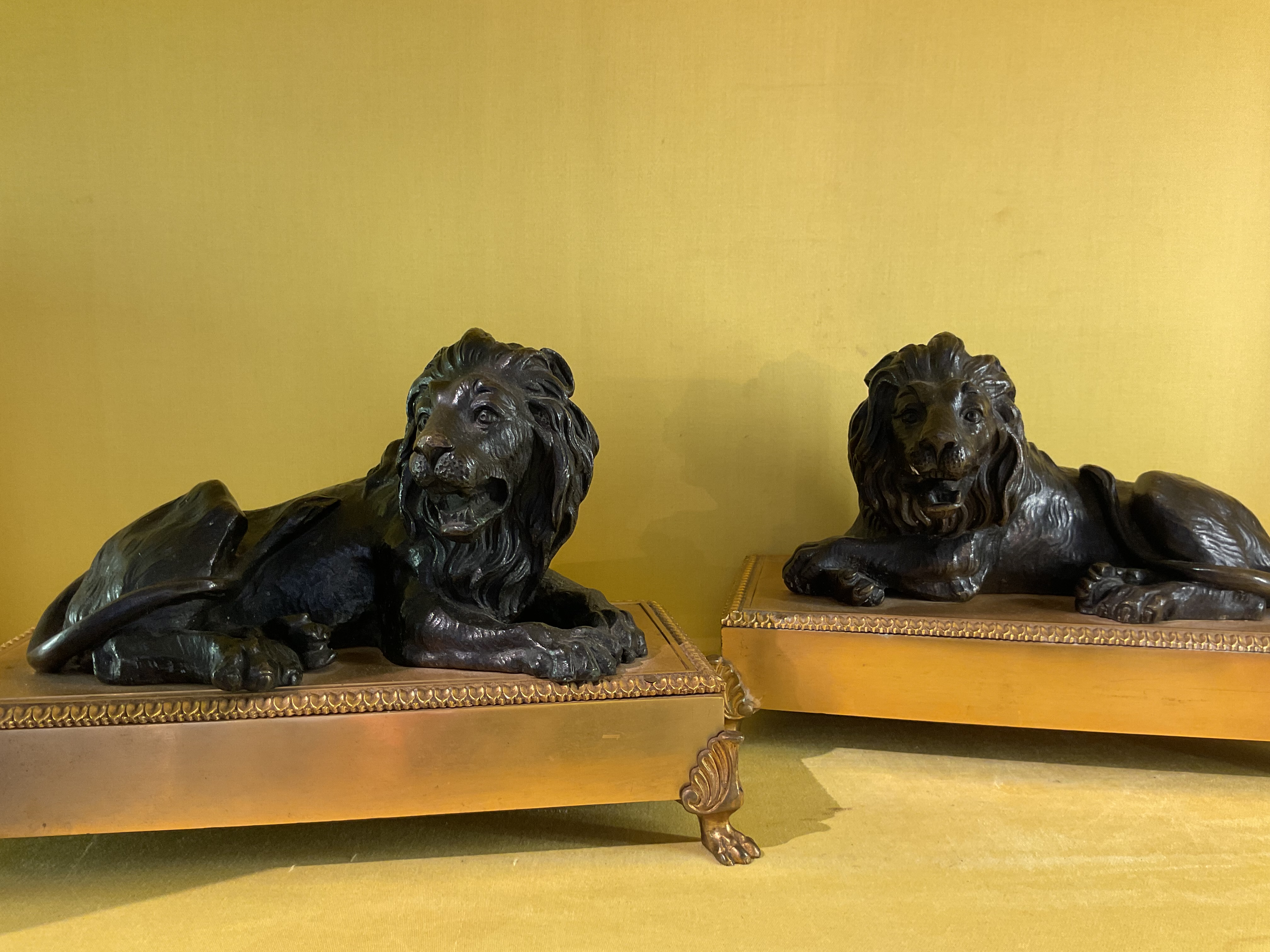 A fine pair of early 19th century bronze models of lions 