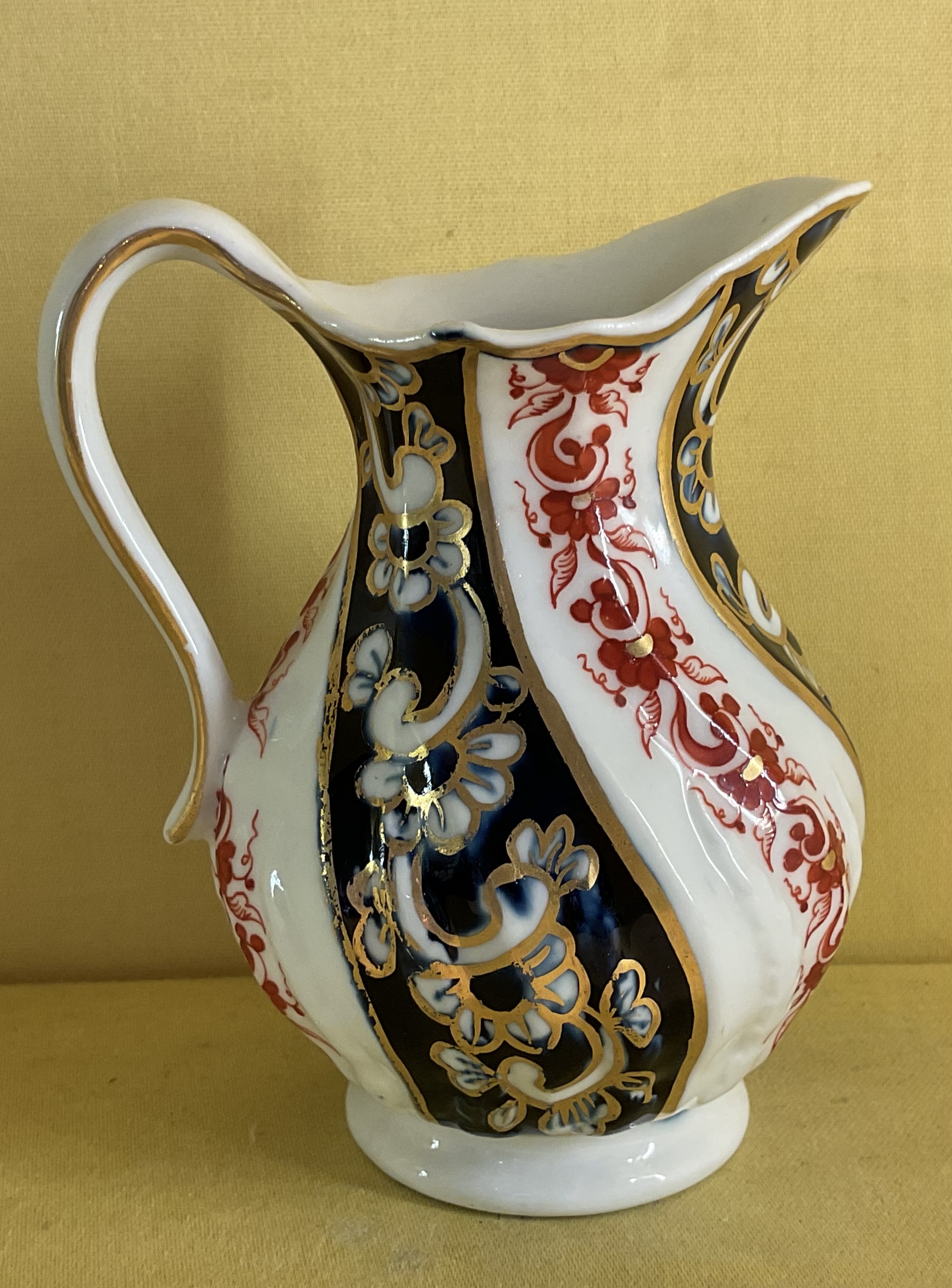 An unusual Chelsea Derby milk jug 