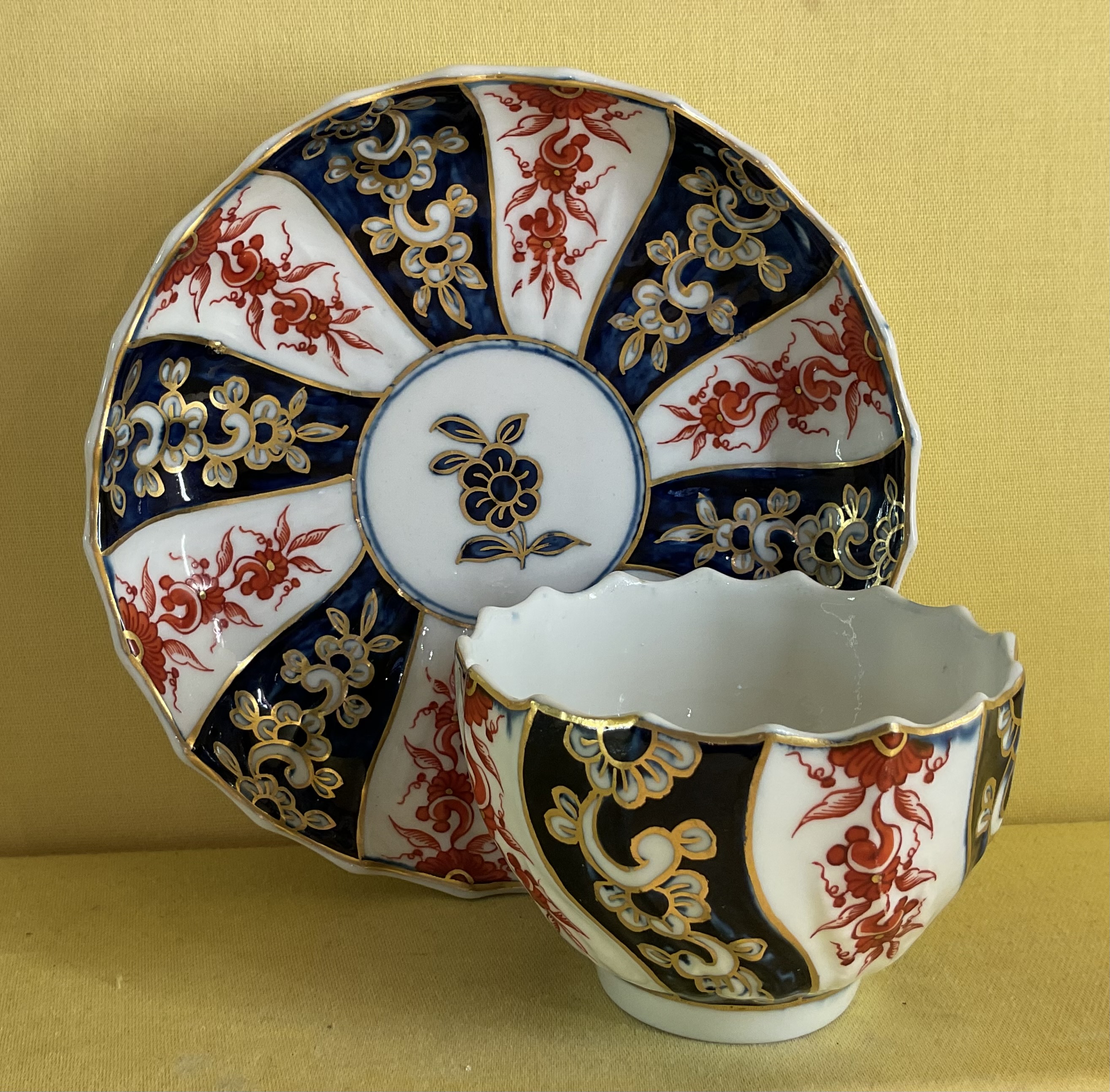 A Chelsea Derby tea bowl and saucer 
