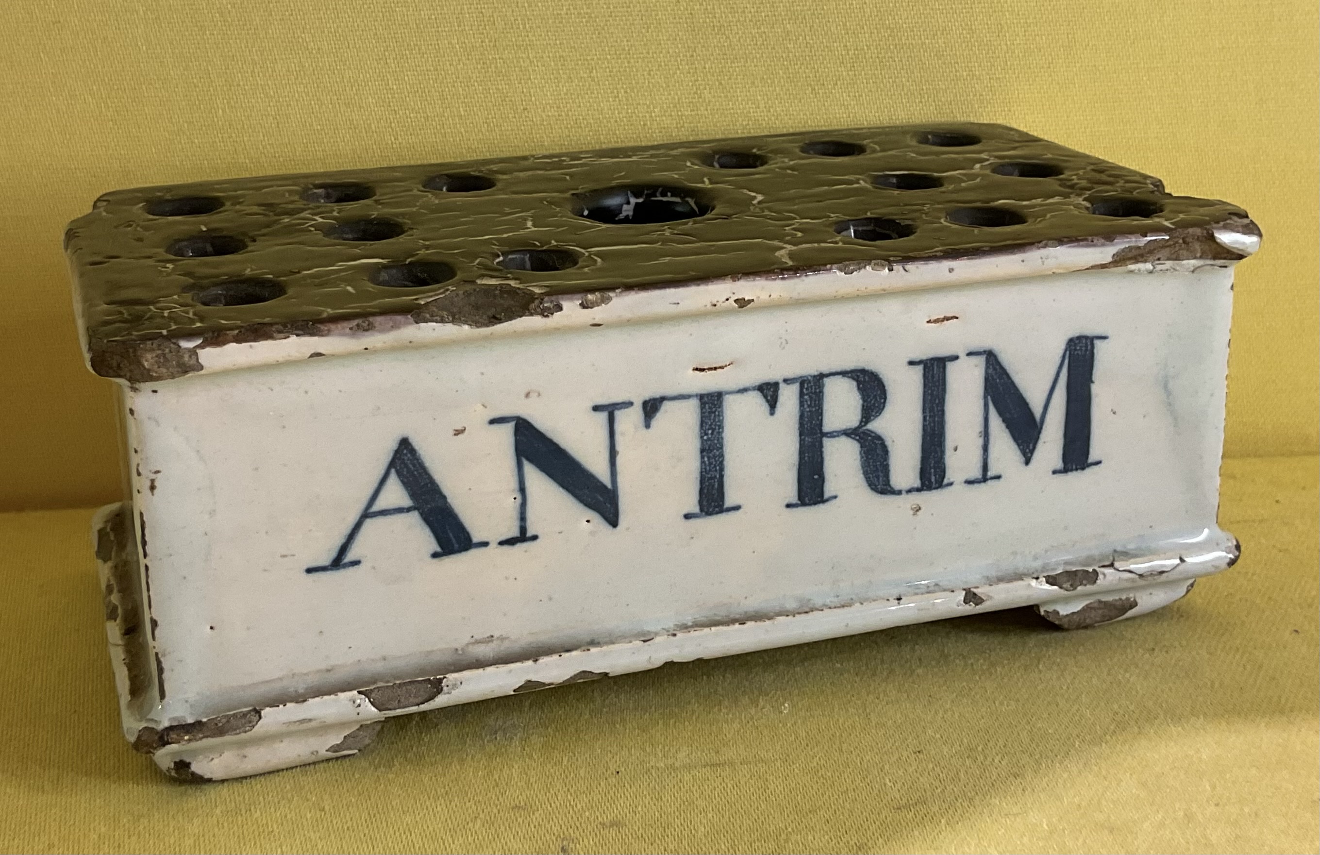 An important and unrecorded dated Irish commemorative delft flower brick