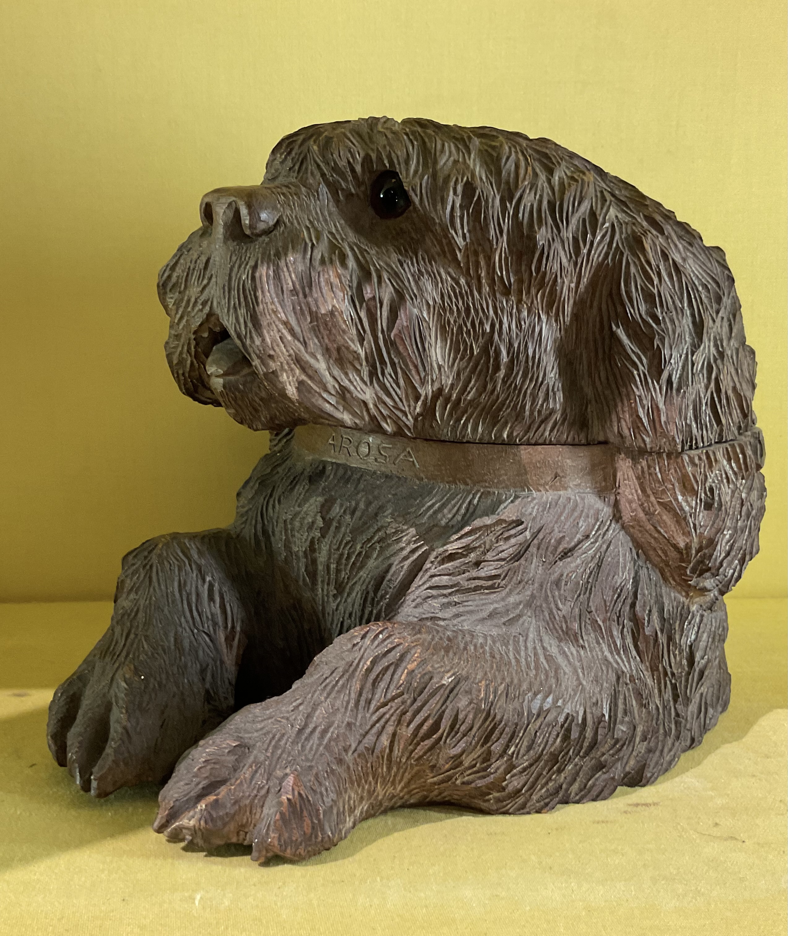 A Black Forest carved tobacco jar, in the manner of Walter Mader 