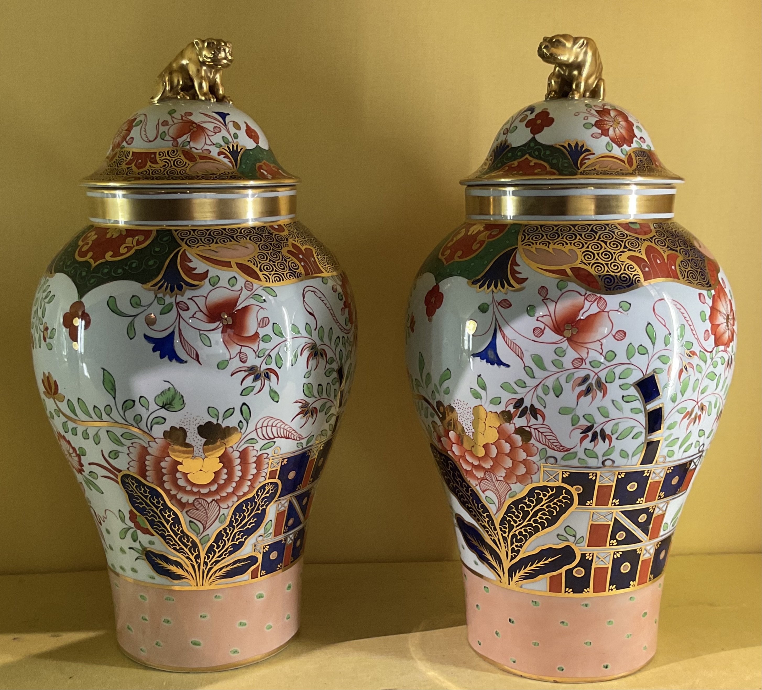 A pair of Copeland Spode earthenware vases and covers 
