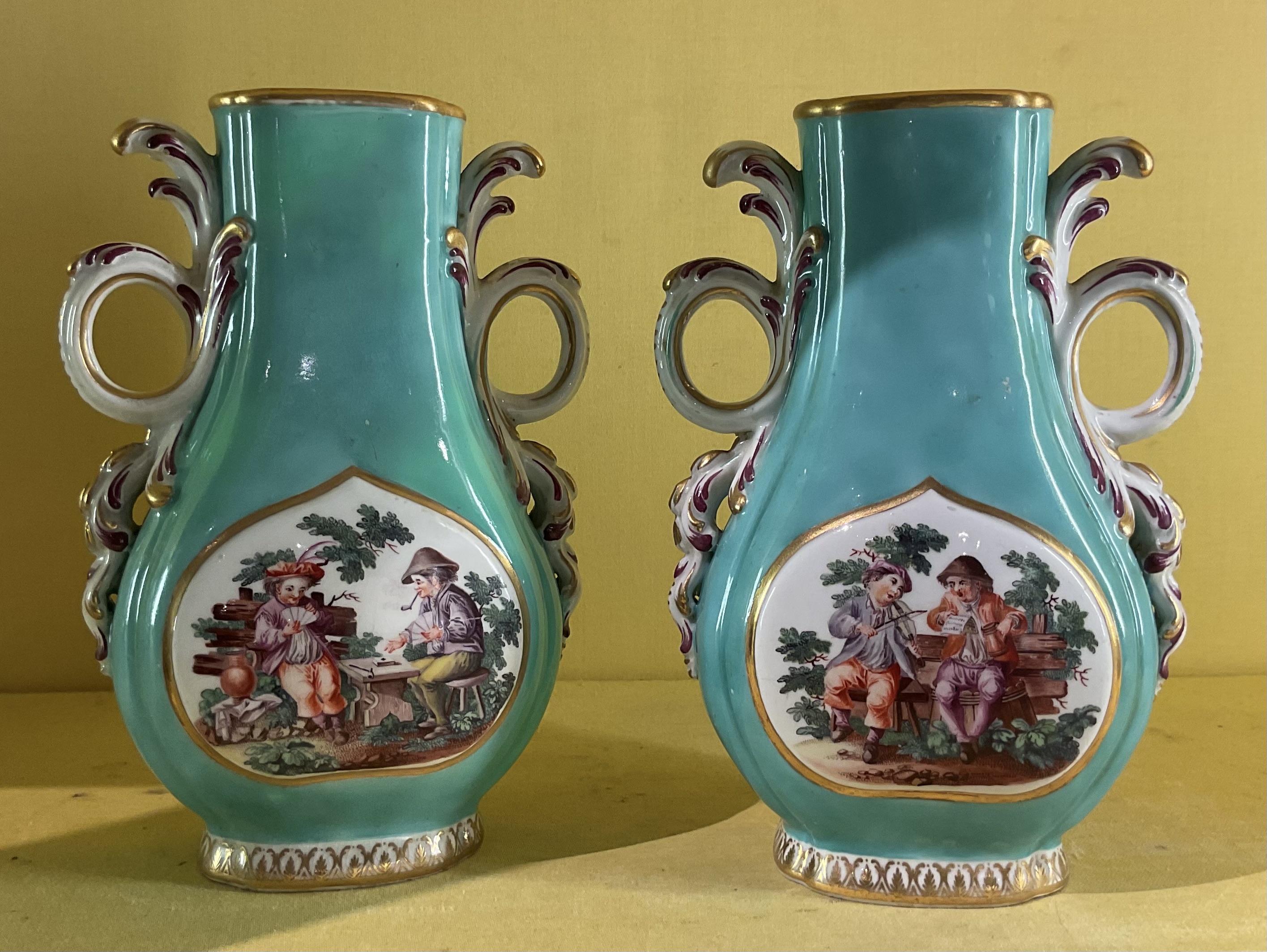 A pair of Chelsea turquoise ground vases 