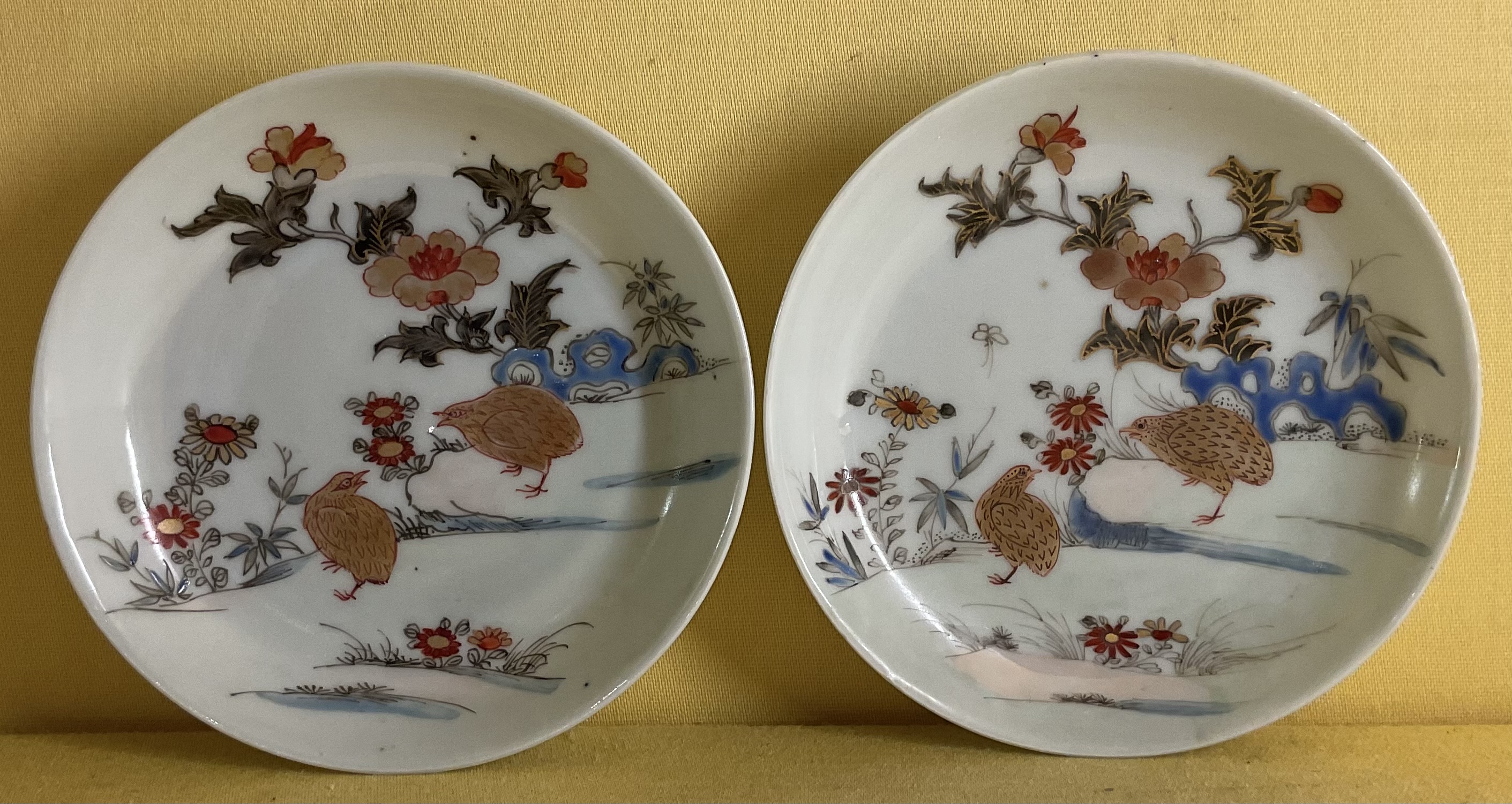 A pair of Chinese Export eggshell porcelain saucers 
