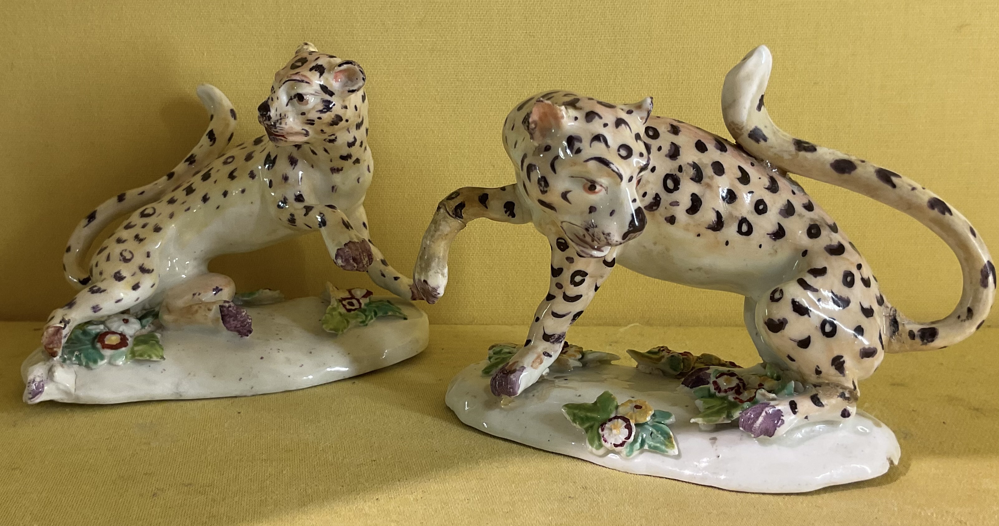 A fine pair of Derby models of prowling leopards 